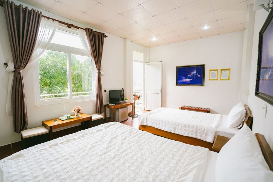 Phòng 2 giường tại Oxalis Home phù hợp cho gia đình 4 người